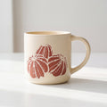 ROOT24STUDIO The Cactus Mug featuring raised terracotta barrel cactus relief on speckled ceramic