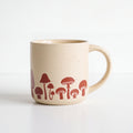 ROOT24STUDIO The Mushroom Mug featuring a panoramic terracotta wild mushroom motif with clean handle spacing