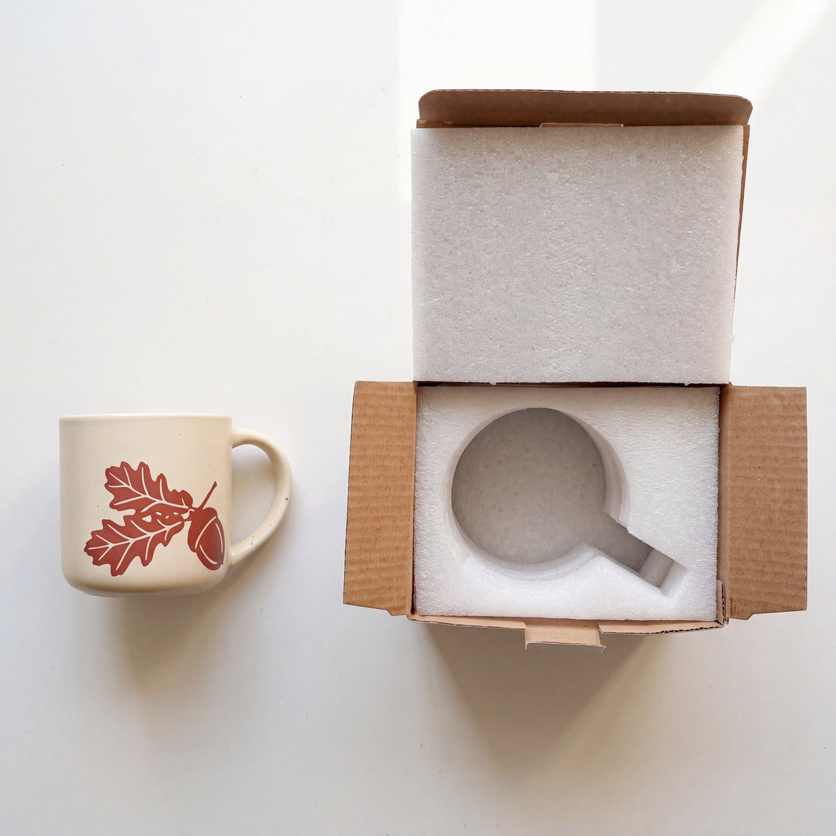 Custom shock-absorbing protective foam packaging and eco-friendly gift box for The Acorn Mug