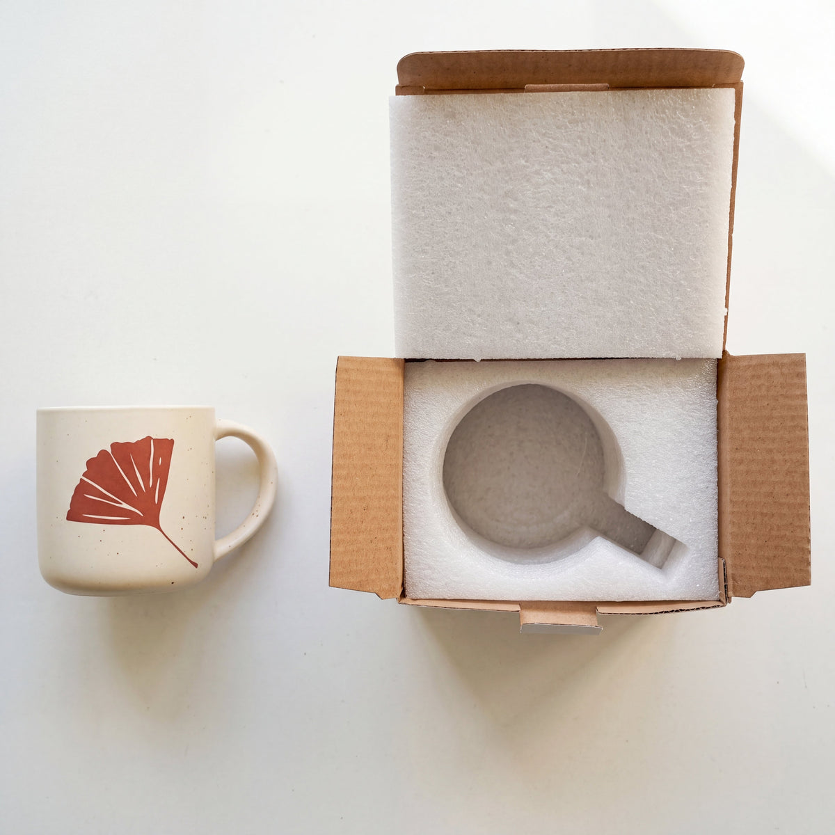 Custom shock-absorbing protective foam packaging and minimalist gift box for The Ginkgo Mug