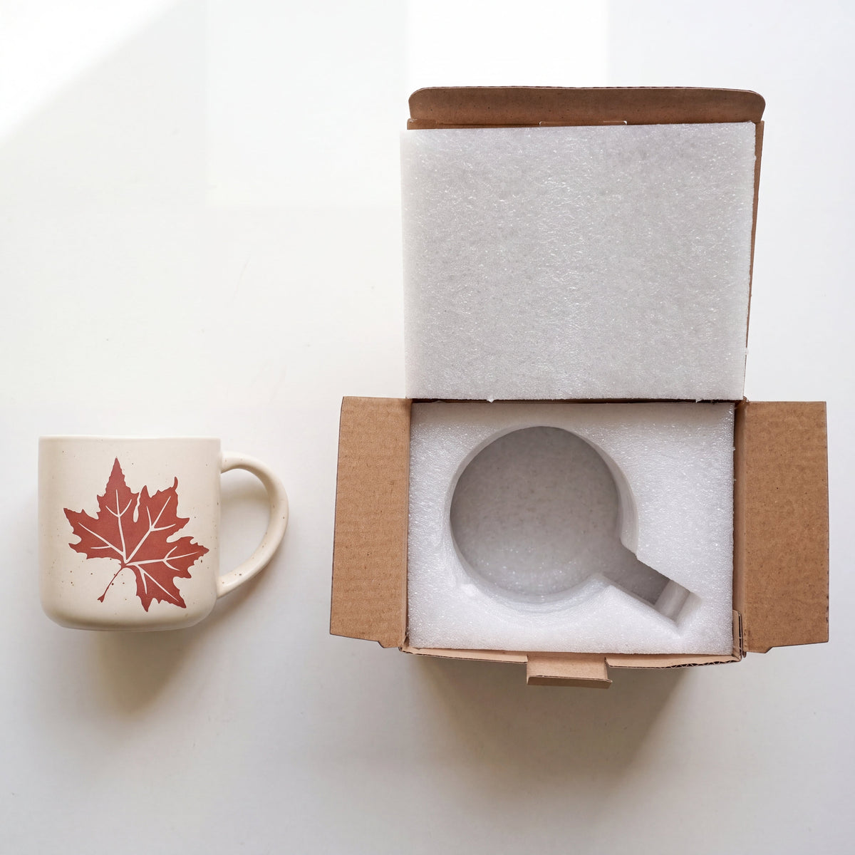 The Maple 12oz stoneware mug safely displayed beside custom shock-absorbing foam packaging and gift-ready box by ROOT24STUDIO