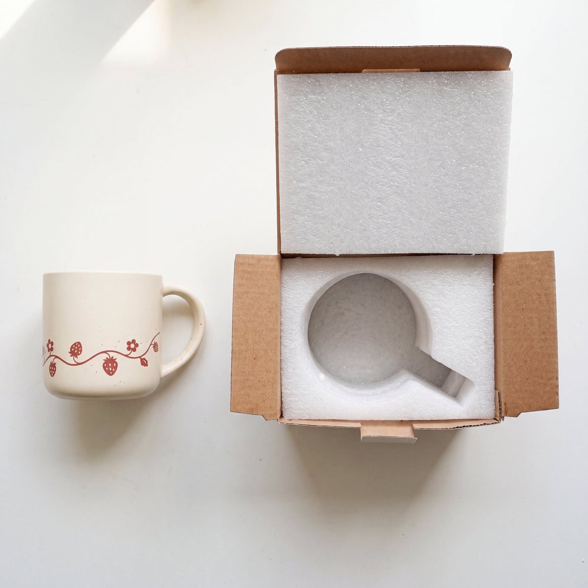 Custom shock-absorbing protective foam packaging and eco-friendly gift box for The Wild Strawberry Mug