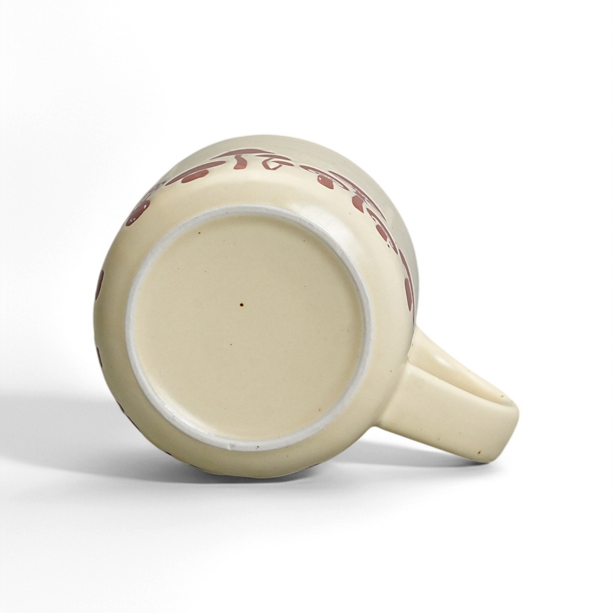 Unglazed raw stoneware foot ring and smooth ceramic base of The Mushroom Mug by ROOT24STUDIO